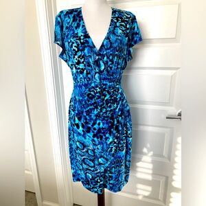 Cache dress. Sz XL fits like a 10/12. Blue black snake leopard print. Worn once.